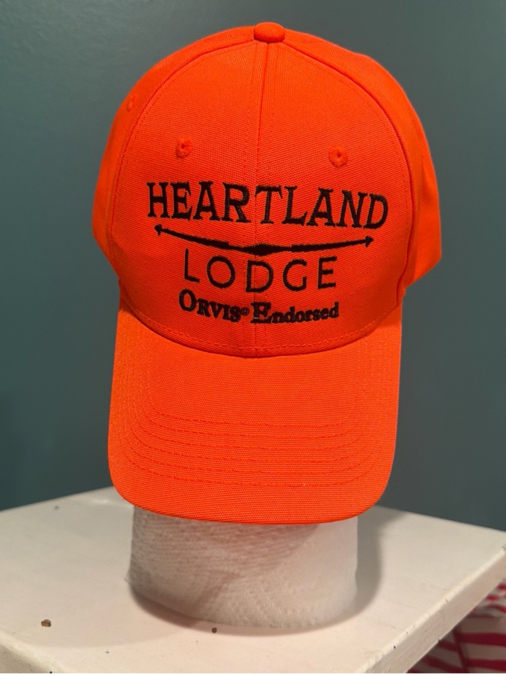 Orvis Bright Orange Cap with Black Interior Label